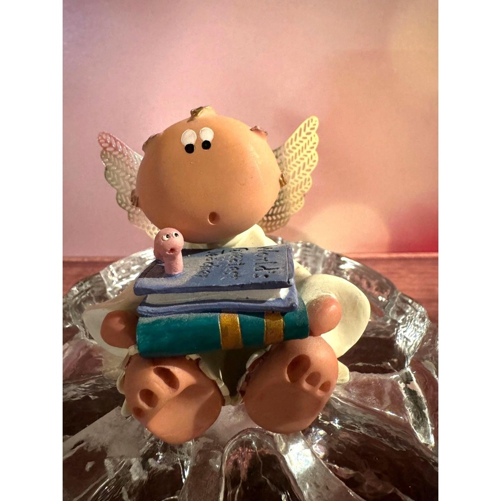 Angel Cheeks World's Greatest Teacher books with bookworm